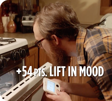 Man testing EEG-based mood tracking device shown in advertisement scene